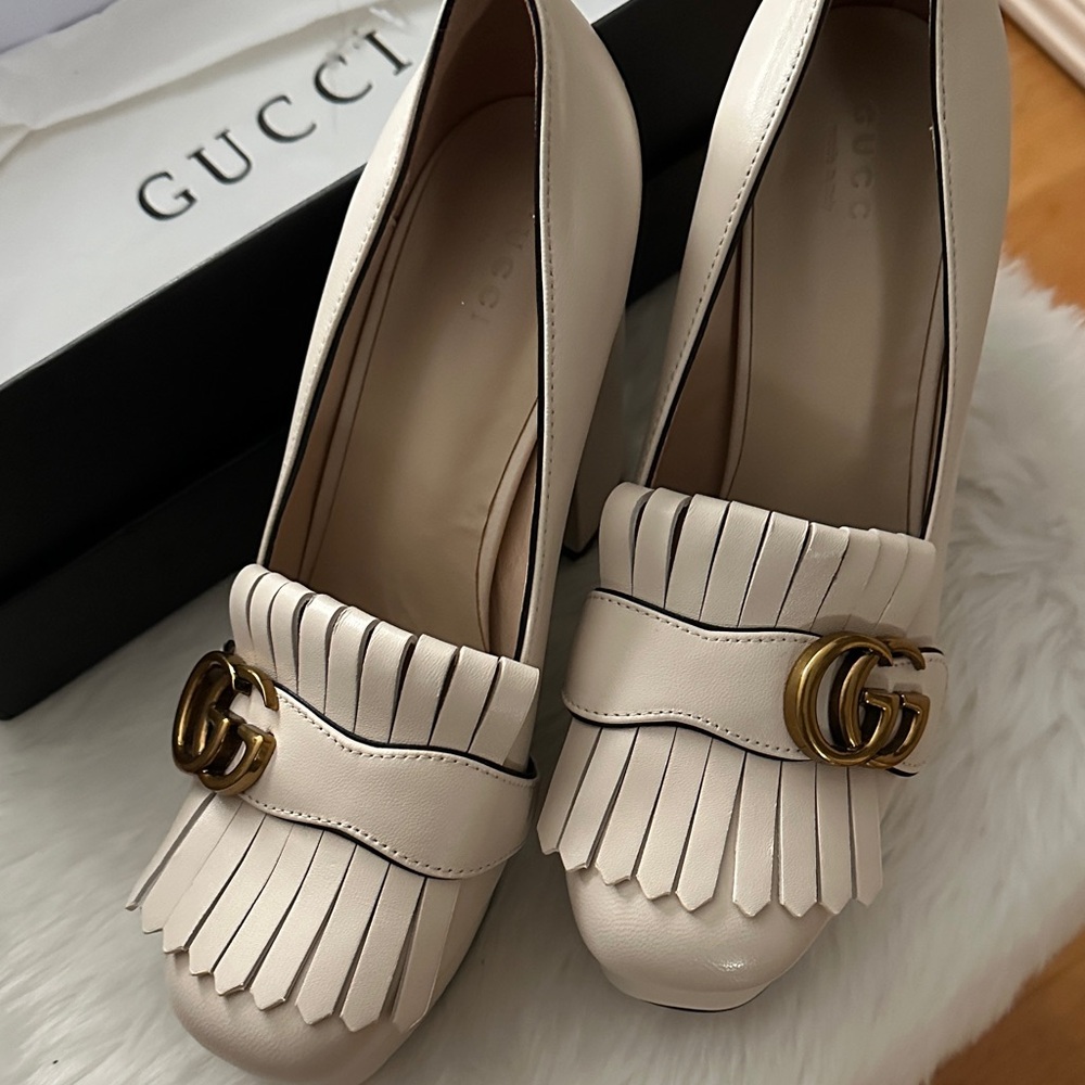 Gucci Cream Leather Kiltie Loafers with Double G Gold Hardware